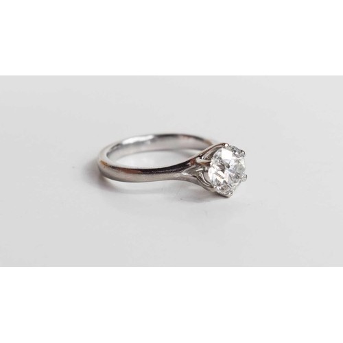 272 - An 18ct white gold, and diamond ring, the brilliant cut diamond approximately 1ct, with six claw set... 