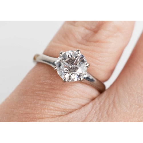 272 - An 18ct white gold, and diamond ring, the brilliant cut diamond approximately 1ct, with six claw set... 