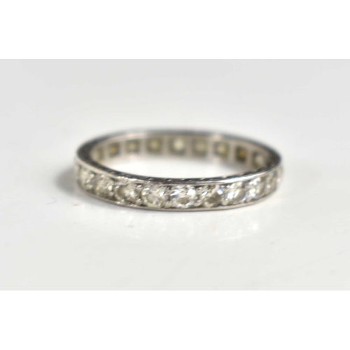 273 - A platinum and diamond full eternity ring, 2.84g, Size I.