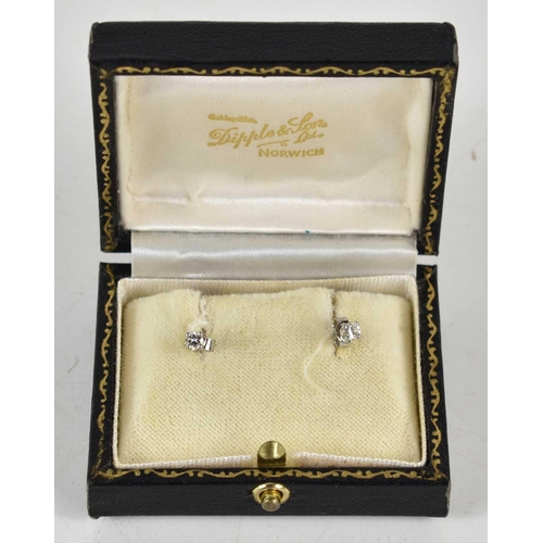 274 - A pair of 18ct gold and diamond earrings, 1.1g, with original case.