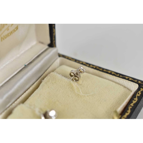 274 - A pair of 18ct gold and diamond earrings, 1.1g, with original case.