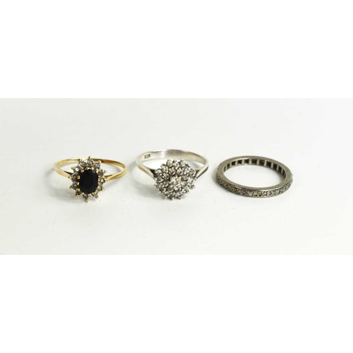 29 - A 9ct gold, sapphire and diamond ring, size T, a silver and paste cluster ring, a white metal and pa... 