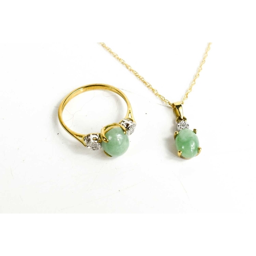 298 - A 9ct gold and pale green jade necklace, the oval jade cabochon surmounted by a diamond, on a 9ct go... 