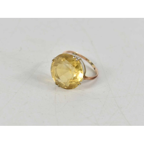 299 - A 9ct gold and citrine ring, 4.7g.