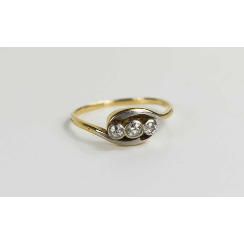 31 - A 9ct gold and diamond three stone ring, size O, 2.2g.