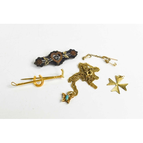 314 - A 9ct gold horse shoe and riding crop bar brooch 2.13g, a silver sweetheart brooch, a silver gilt ne... 