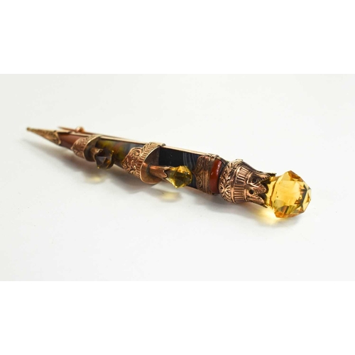 317 - A 9ct rose gold Scottish dirk brooch, set with specimen agates and citrine to the graduated thistles... 