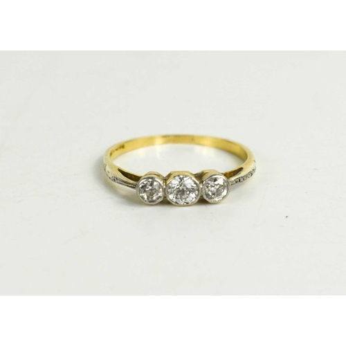 319 - An 18ct gold and diamond three stone ring, old cut diamonds totalling approximately ½ct, size Q, 2.1... 