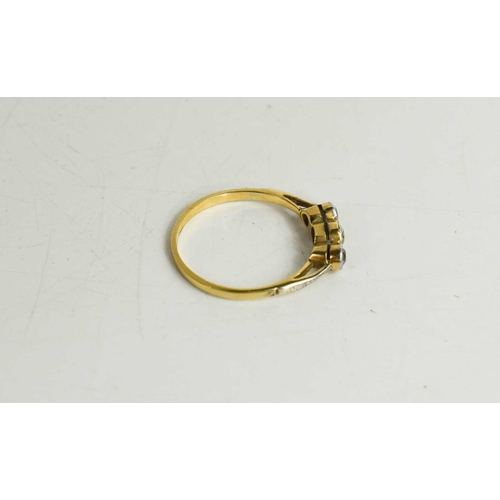 319 - An 18ct gold and diamond three stone ring, old cut diamonds totalling approximately ½ct, size Q, 2.1... 