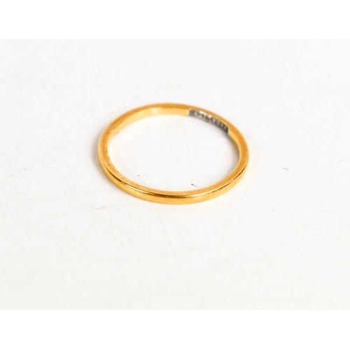 324 - A 22ct gold wedding band, size L, 1.4g.