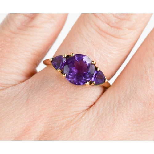 326 - A 9ct gold and amethyst ring, the central brilliant cut amethyst approximately 2½cts, size M, 2.32g.