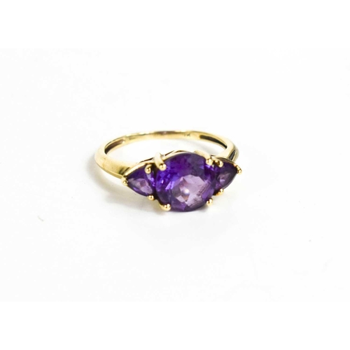 326 - A 9ct gold and amethyst ring, the central brilliant cut amethyst approximately 2½cts, size M, 2.32g.