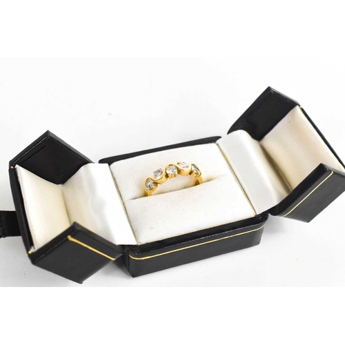 327 - An 18ct gold and diamond five stone ring, each brilliant cut diamond approximately ¼ct each, size O,... 