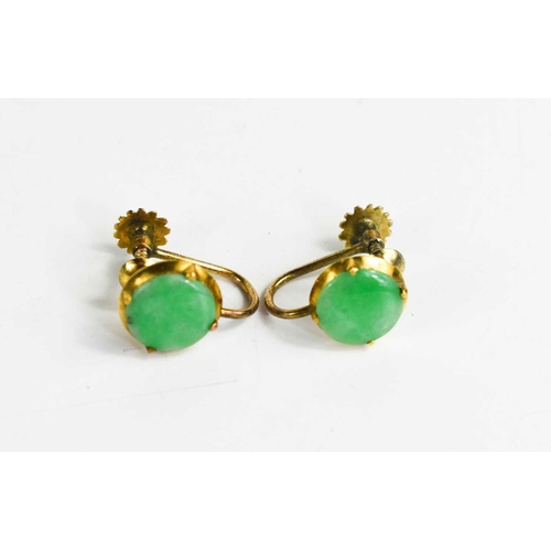 339 - A pair of 9ct gold and jade earrings, the circular jade discs in a four claw enclosed setting, with ... 