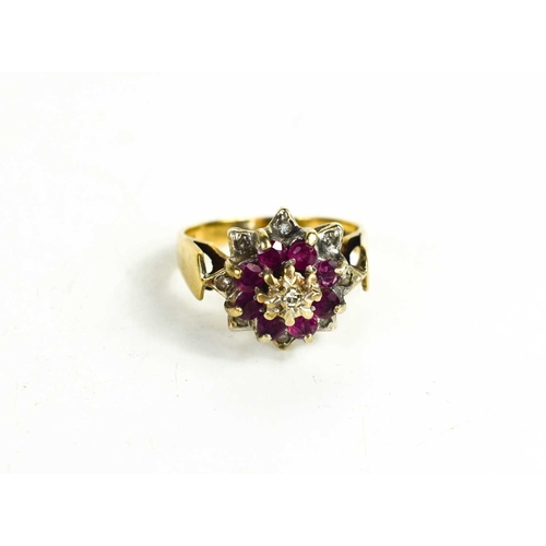 34 - A 9ct gold, diamond and pink sapphire cluster ring, of flowerhead form, set with brilliant cut diamo... 