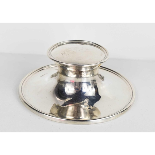 345 - A silver capstan inkwell with clear glass liner, hallmarked for Birmingham 1945.