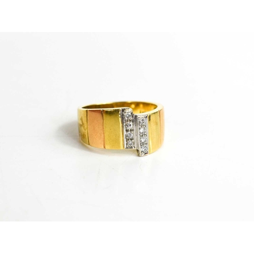 35 - An 18ct gold and diamond ring, the eight brilliant cut diamonds set in two rows of four, size M/N, 6... 