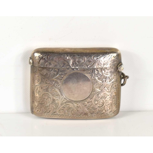 350 - A silver vesta case with foliate decoration, hallmarked for Chester 1908, 1.7toz.