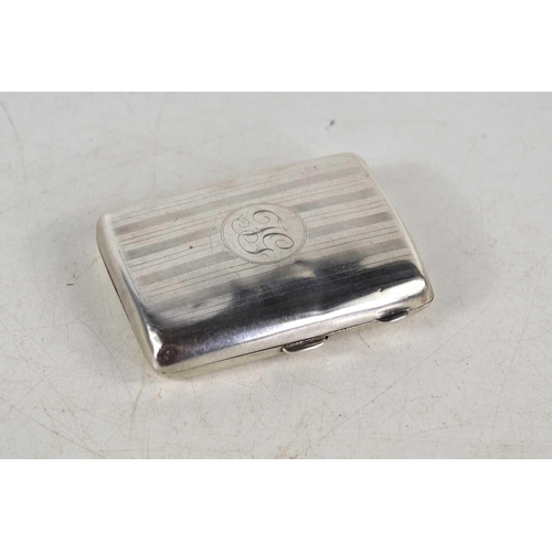 352 - An early 20th century silver cigarette case, monogrammed engraved, 8cm by 6cm, 1.9toz.