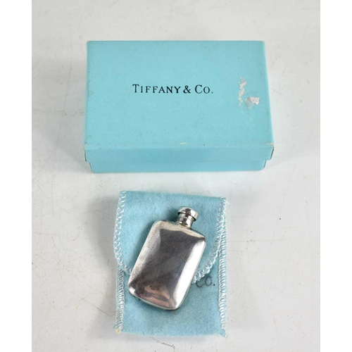 355 - A Tiffany & Co silver scent bottle of rectangular form, 2.5cm by 4.5cm.