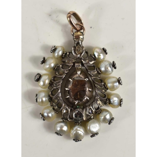 36 - A 19th century possibly Georgian white metal diamond and pearl pendant, the central old cut diamond ... 