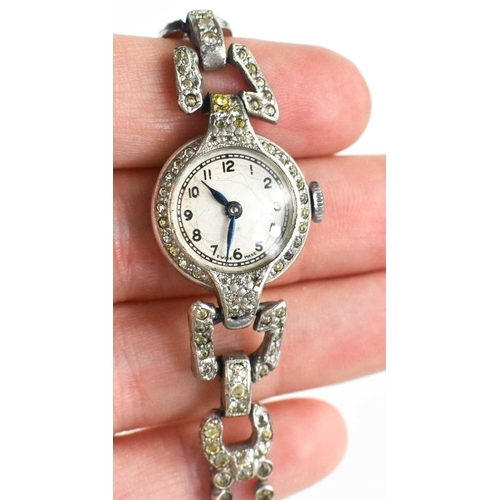 363 - An Art Deco steel and paste ladies cocktail wristwatch, with circular Arabic dial, folding clasp.