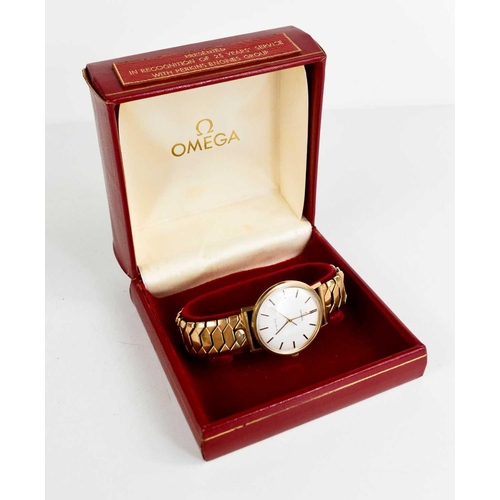 370 - A 9ct gold Omega 'Geneve' gentleman's wristwatch, baton dial, gold plated strap and original box.