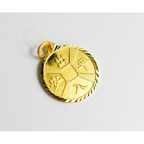 39 - A Chinese gold Feng Shui pendant, testing as at least 14ct gold, the disc form pendant bearing calli... 