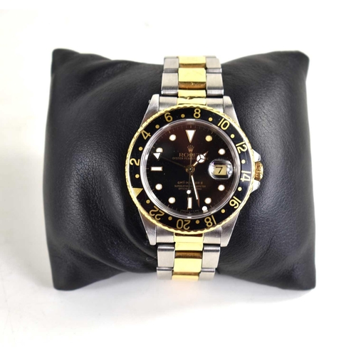 391 - A Rolex GMT Master II Oyster Perpetual gentleman's automatic wristwatch, calibre 3185, black dial wi... 