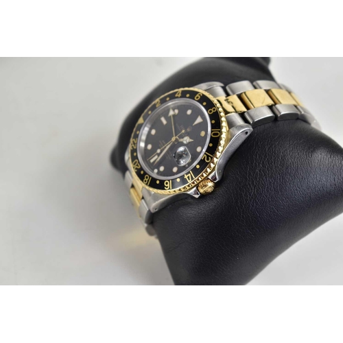 391 - A Rolex GMT Master II Oyster Perpetual gentleman's automatic wristwatch, calibre 3185, black dial wi... 