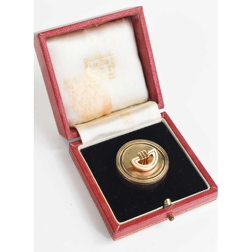 42 - A 9ct gold Cartier pill box, Art Deco period, in the original presentation case, 23g