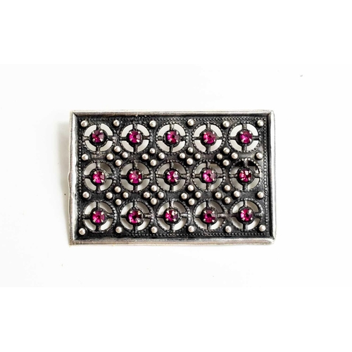 49 - A Russian Soviet silver Art Deco period brooch, set with pink paste stones in a rectangular setting,... 