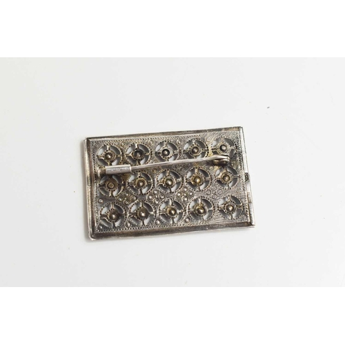 49 - A Russian Soviet silver Art Deco period brooch, set with pink paste stones in a rectangular setting,... 