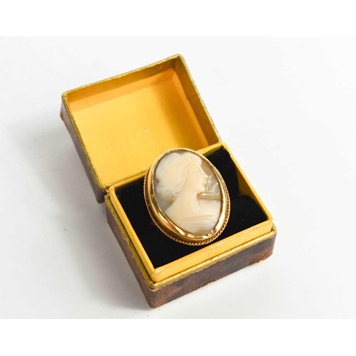 50 - A 9ct gold & cameo ring, depicting a female profile portrait in an oval setting, size N, 6.6g.