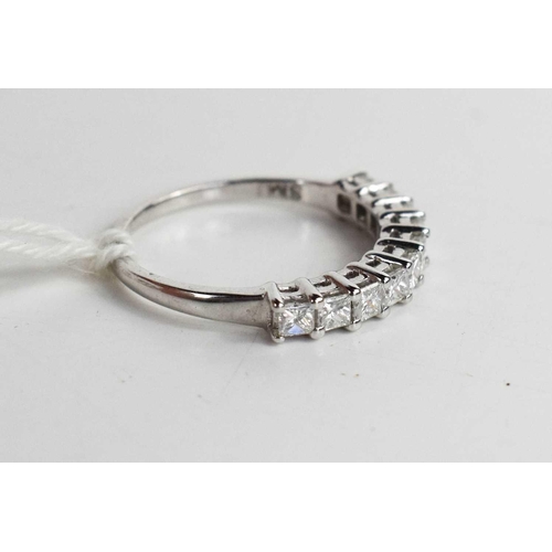 54 - An 18ct white gold and diamond ring, comprising ten brilliant cut diamonds, size K, 2.14g.