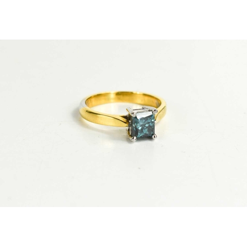 58 - An 18ct yellow gold and blue diamond solitaire ring, the princess cut diamond approximately 1ct, cer... 