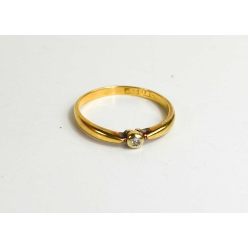 69 - An 18ct gold and diamond solitaire ring, size P, 2.46g.