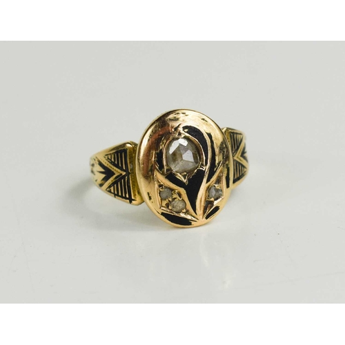 78 - A 9ct gold, diamond and enamel mourning ring, the oval enamelled in black to depict a lily of the va... 