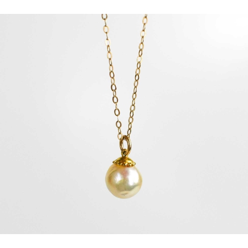 95 - A 9ct gold and pearl pendant necklace, the single pearl approximately 8mm diameter, 2g total.