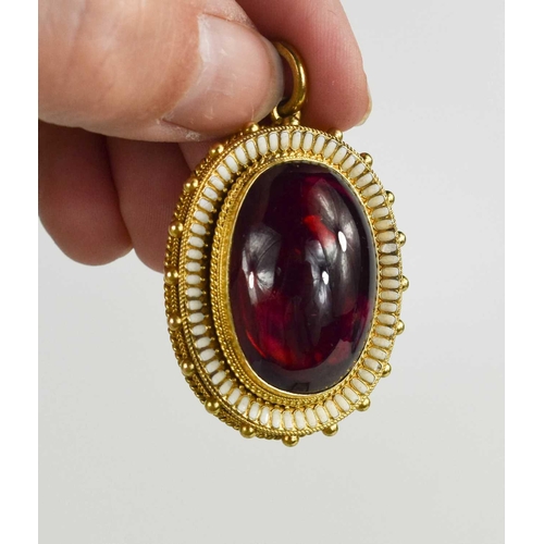 97 - A Victorian gold, garnet cabochon and enamel mourning pendant, the garnet with foil back with an int... 