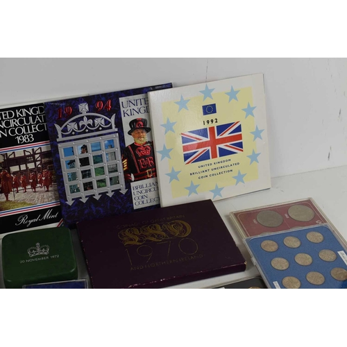 106 - A quantity of GB commemorative coins to include a Royal Mint 1991 and 1996 proof coin set, silver pr... 