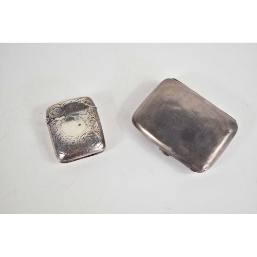 12 - A Victorian silver vesta case together with a silver cigarette case, 3.1toz.