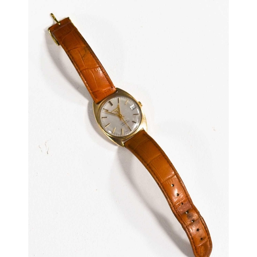 126 - A Longines Conquest Automatic gold cased wristwatch, silvered dial and batons, with tan leather stra... 