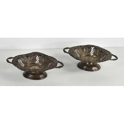 14 - A pair of Victorian silver bon bon dishes, with pierced and embossed decoration, hallmarked for Birm... 