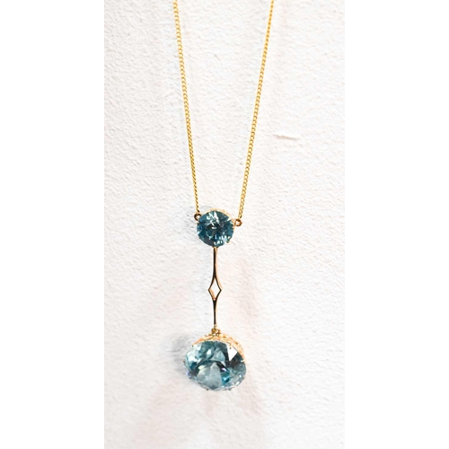 152 - A 9ct gold and blue zircon pendant necklace, the pale blue brilliant cut zircons; 15mm and 8mm diame... 