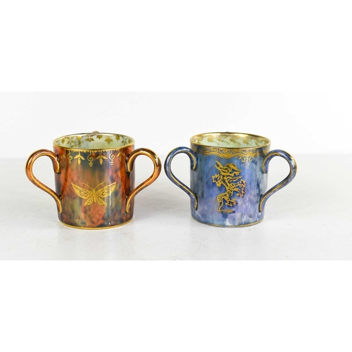 156 - Two Wedgwood Fairyland lustre loving cups, one decorated with snakes on a pearl blue ground, the oth... 