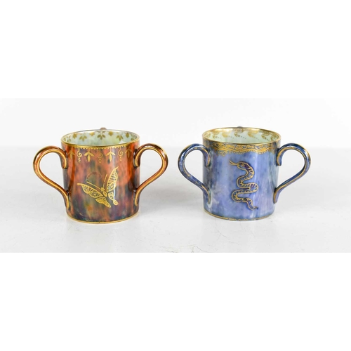 156 - Two Wedgwood Fairyland lustre loving cups, one decorated with snakes on a pearl blue ground, the oth... 