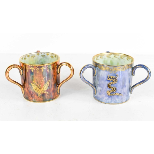 156 - Two Wedgwood Fairyland lustre loving cups, one decorated with snakes on a pearl blue ground, the oth... 