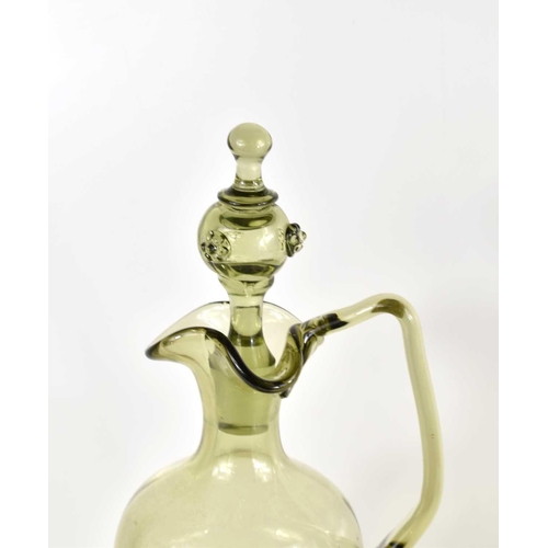 175 - A late 19th century German olive green decanter, hand blown with ruffle rim, the stopper having apll... 