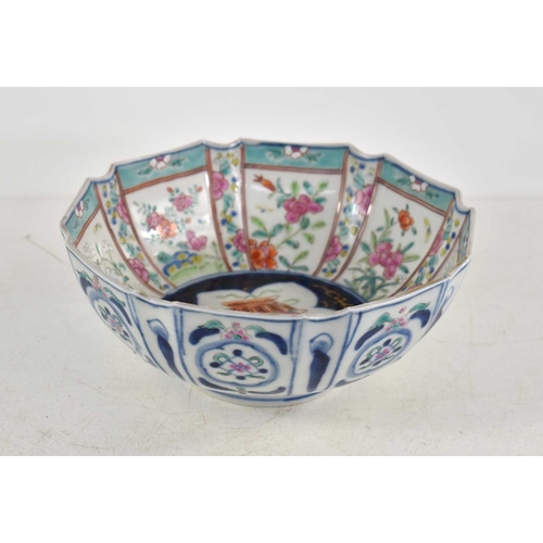 191 - An Oriental bowl decorated with panels of flowers, cut rim with flower basket cartouche, 17.5cm wide... 